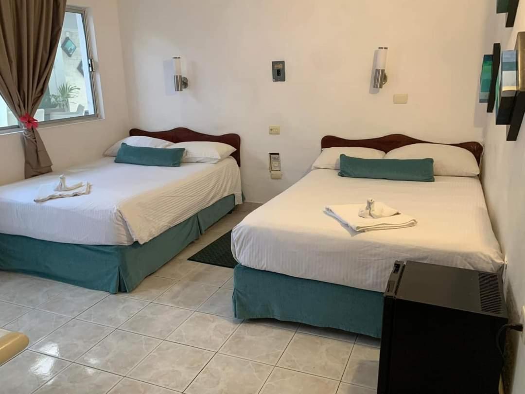 Hotel Hermanos Aguilar Косумель Экстерьер фото